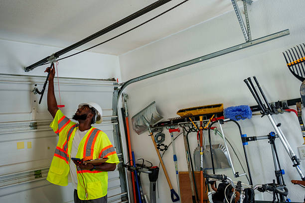 Professional Garage Door Panel Replacement technician working in Port Dickinson, NY